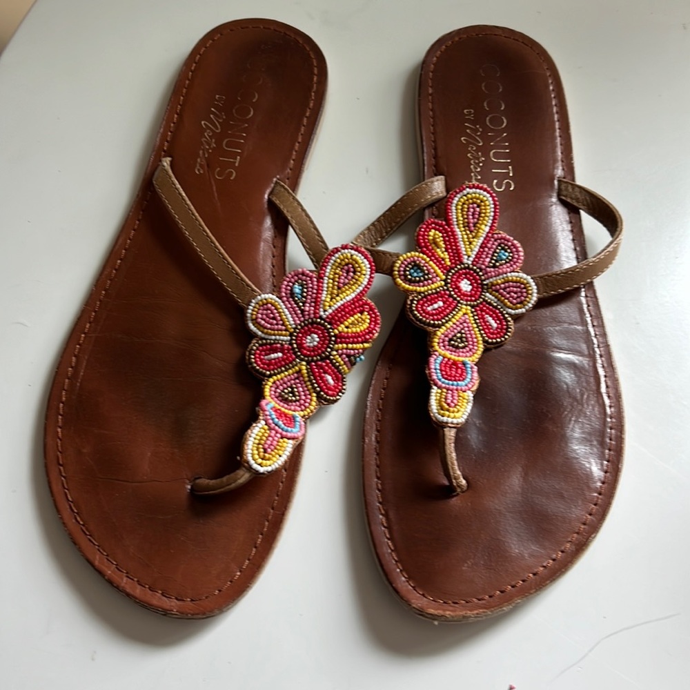 Coconuts sandals in size 11.